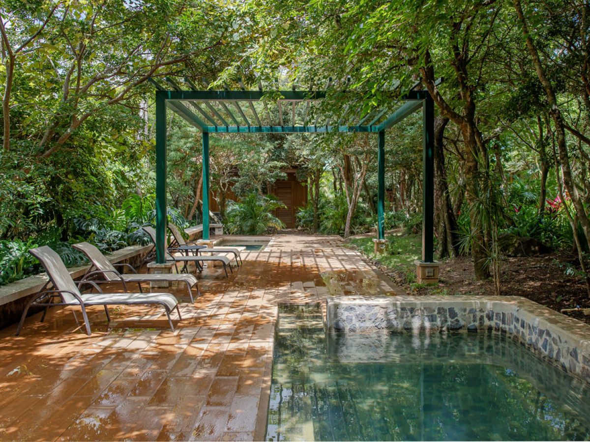 a bridge over a pool of water