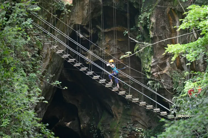 girl climbing canopy