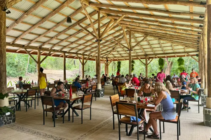 a group of people sitting at a table