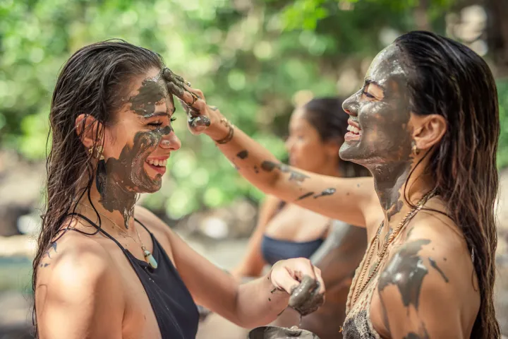 a woman holding a cell phone