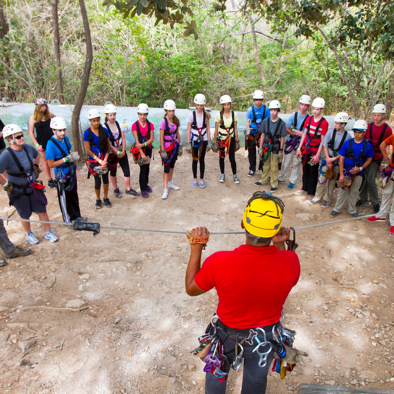 Kids going on canopy zip line tour
