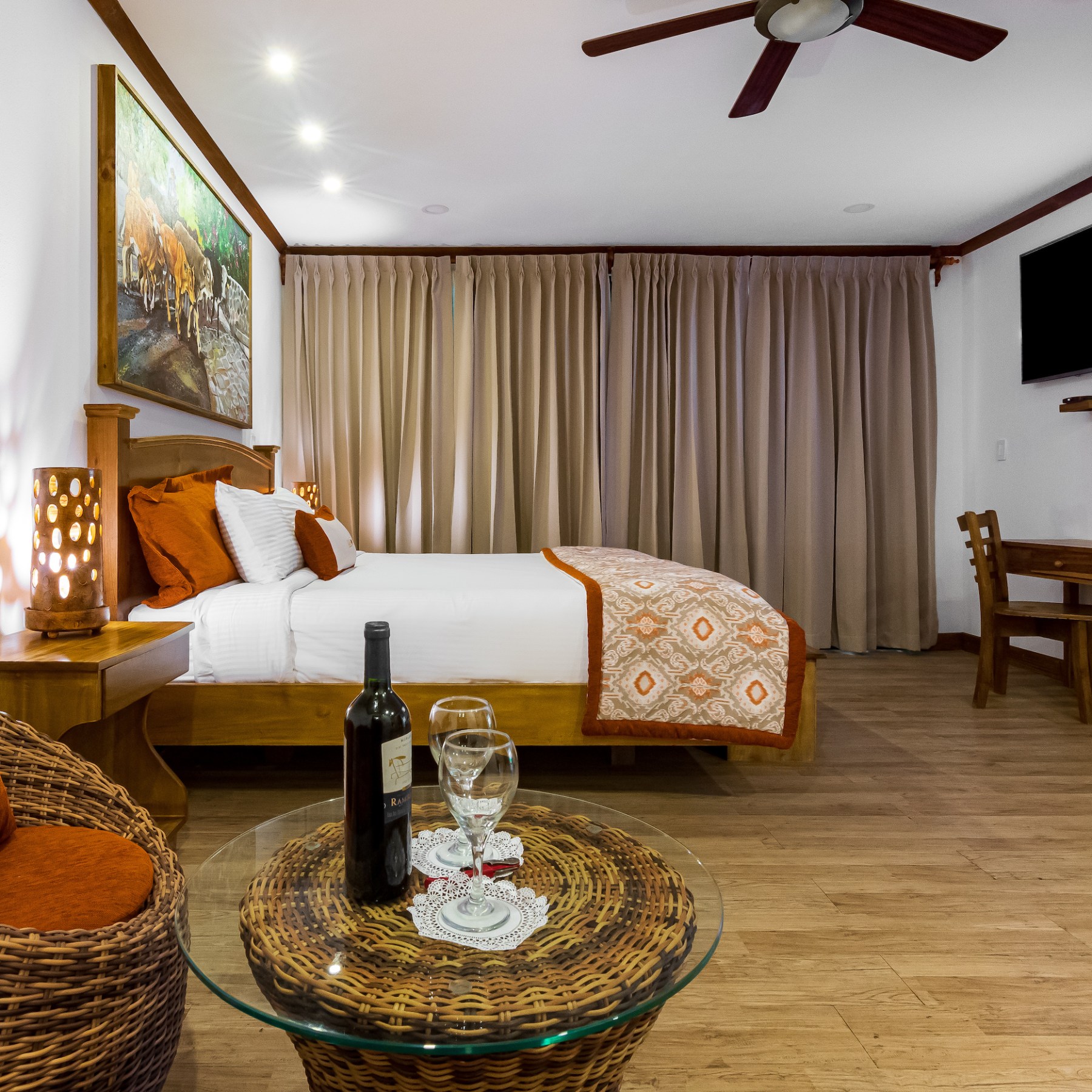 Hotel Hacienda Guachipelin suite with wine