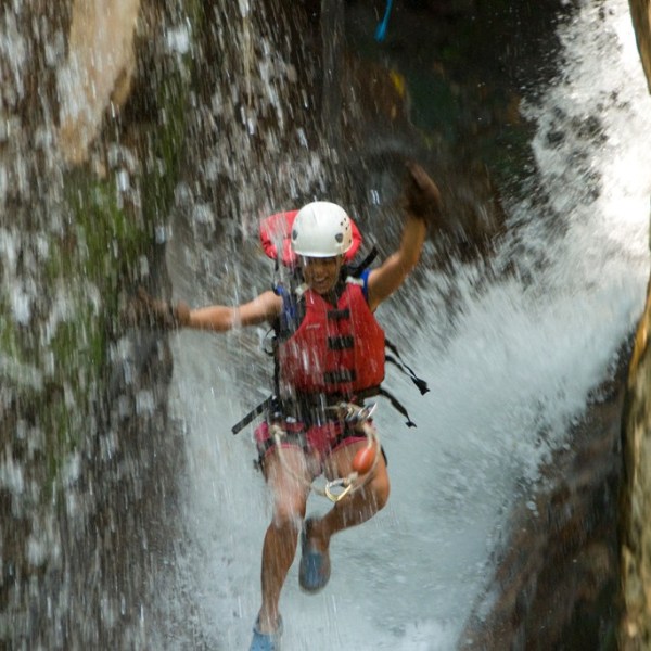 a man riding skis down a river