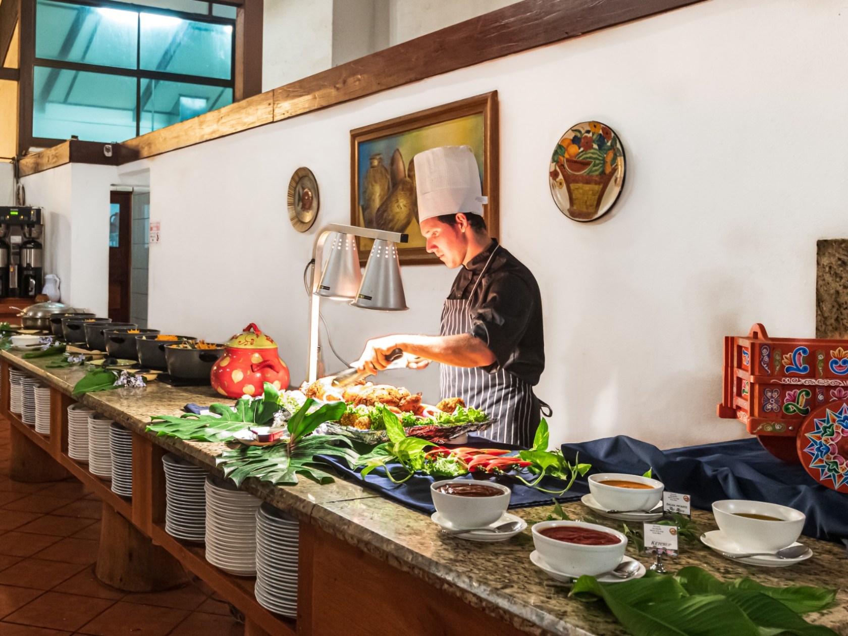 a group of people in a kitchen