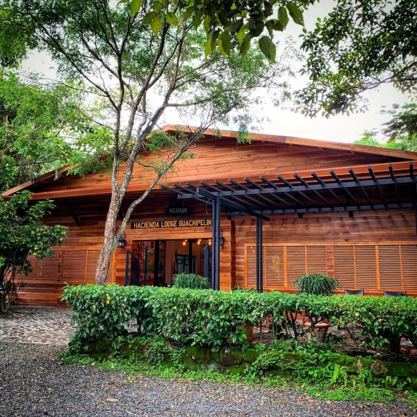 a house with bushes in front of a building