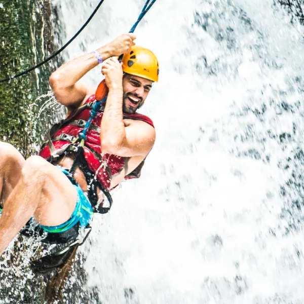 a person riding a surf board in the air