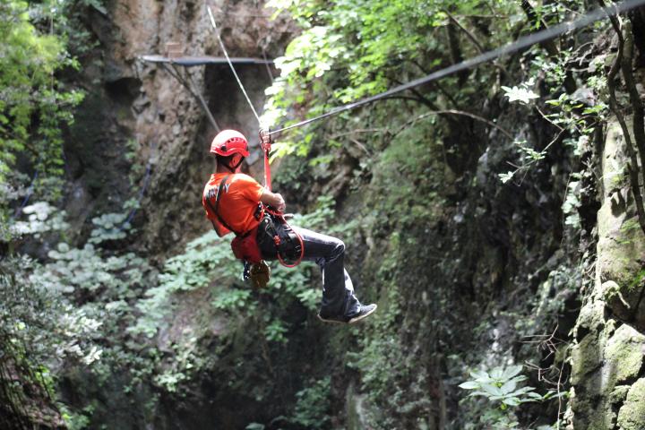 a man flying through the air while riding skis