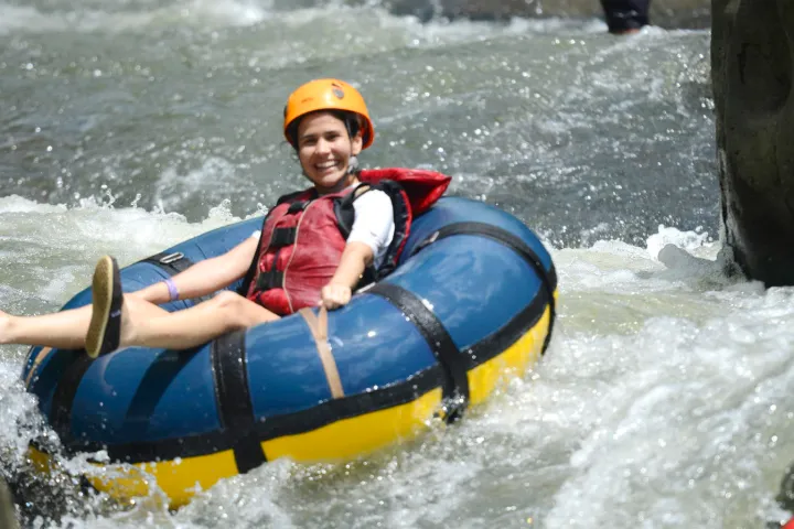 a person riding a wave on a surfboard in the water