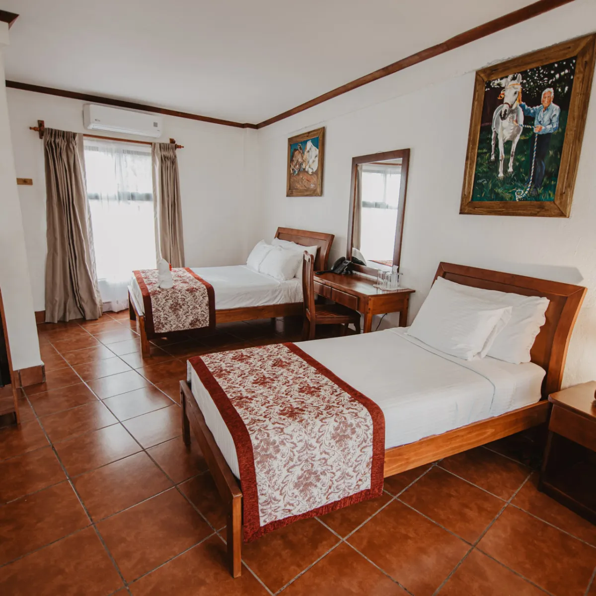 a bedroom with a bed in a room