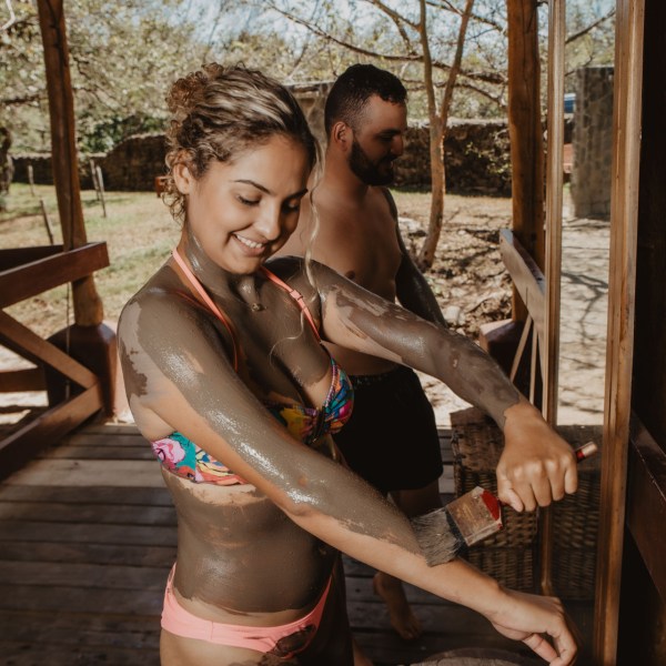 a girl sitting on a table