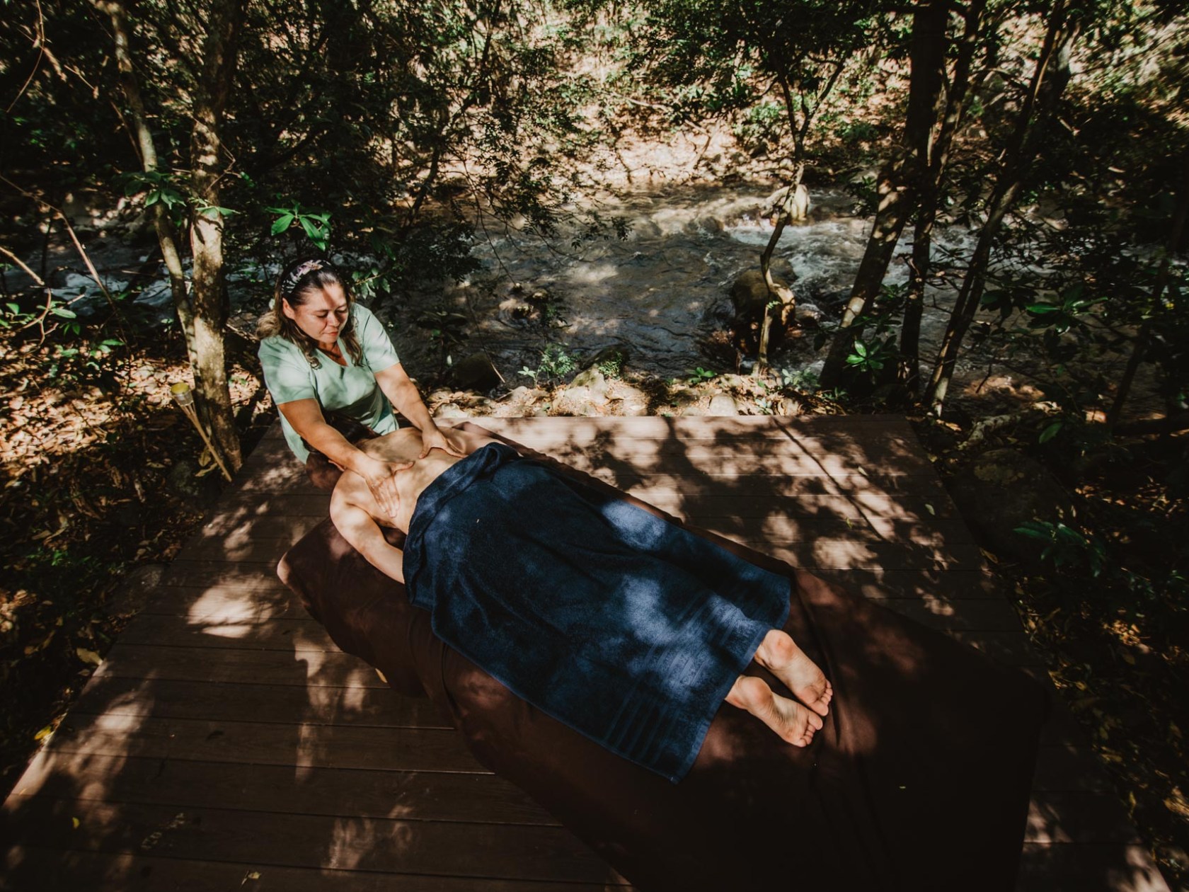 a person sitting in a tree