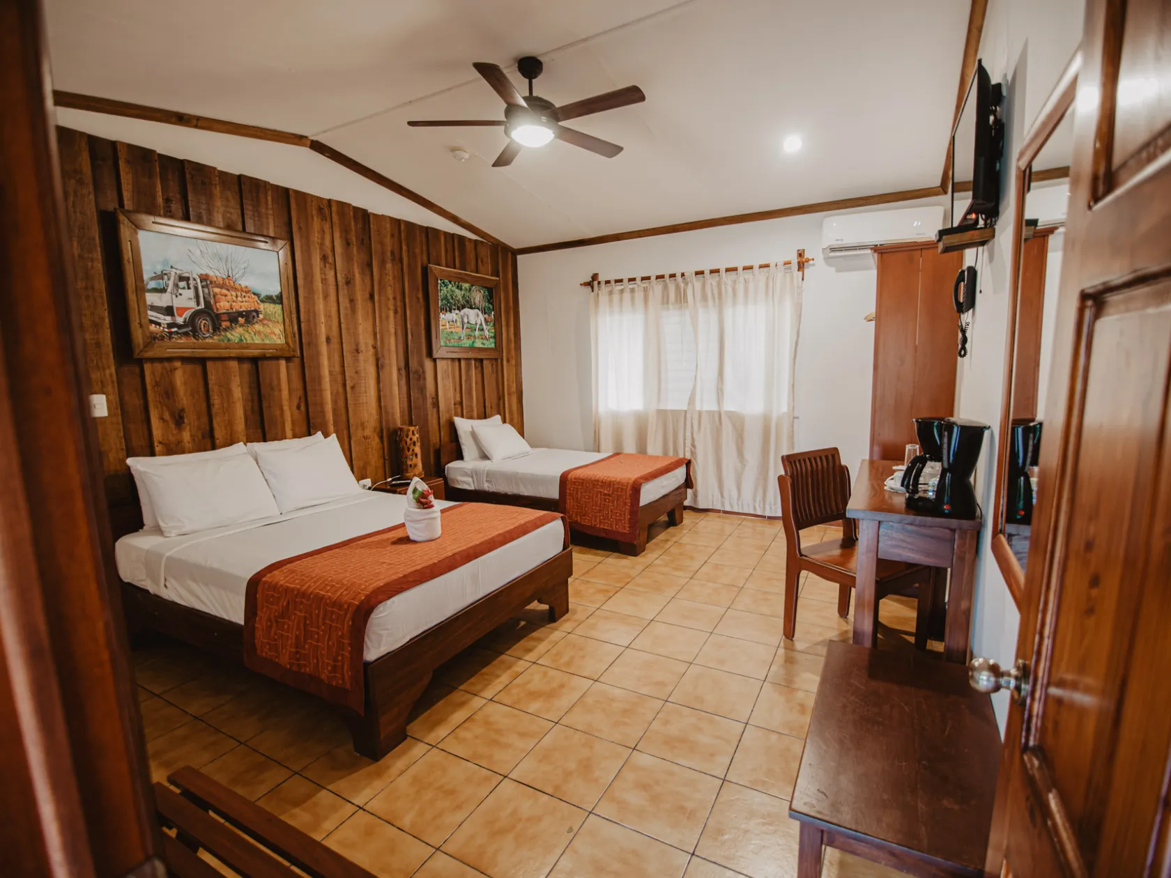 a bedroom with a bed in a room