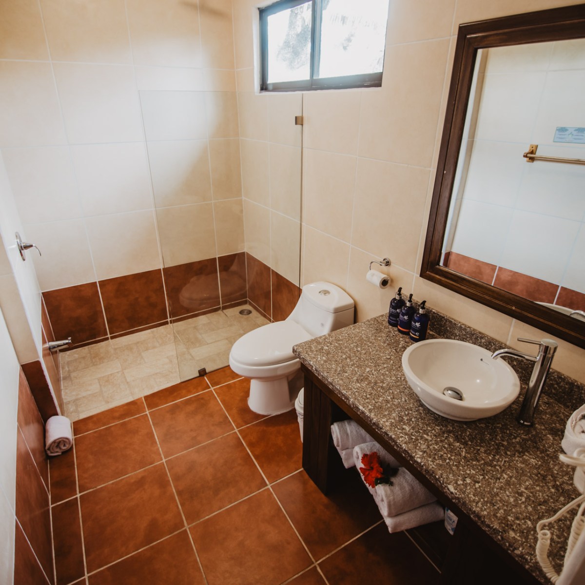 a white tub sitting next to a sink