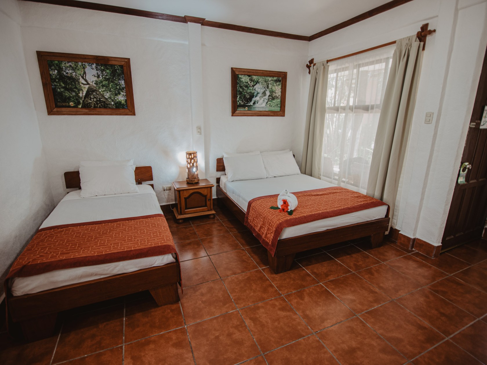 a bedroom with a bed in a room