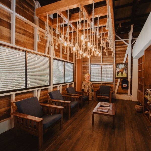 a room filled with furniture and a large window