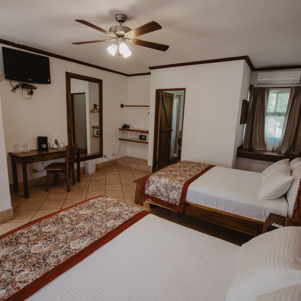 a bedroom with a bed in a hotel room