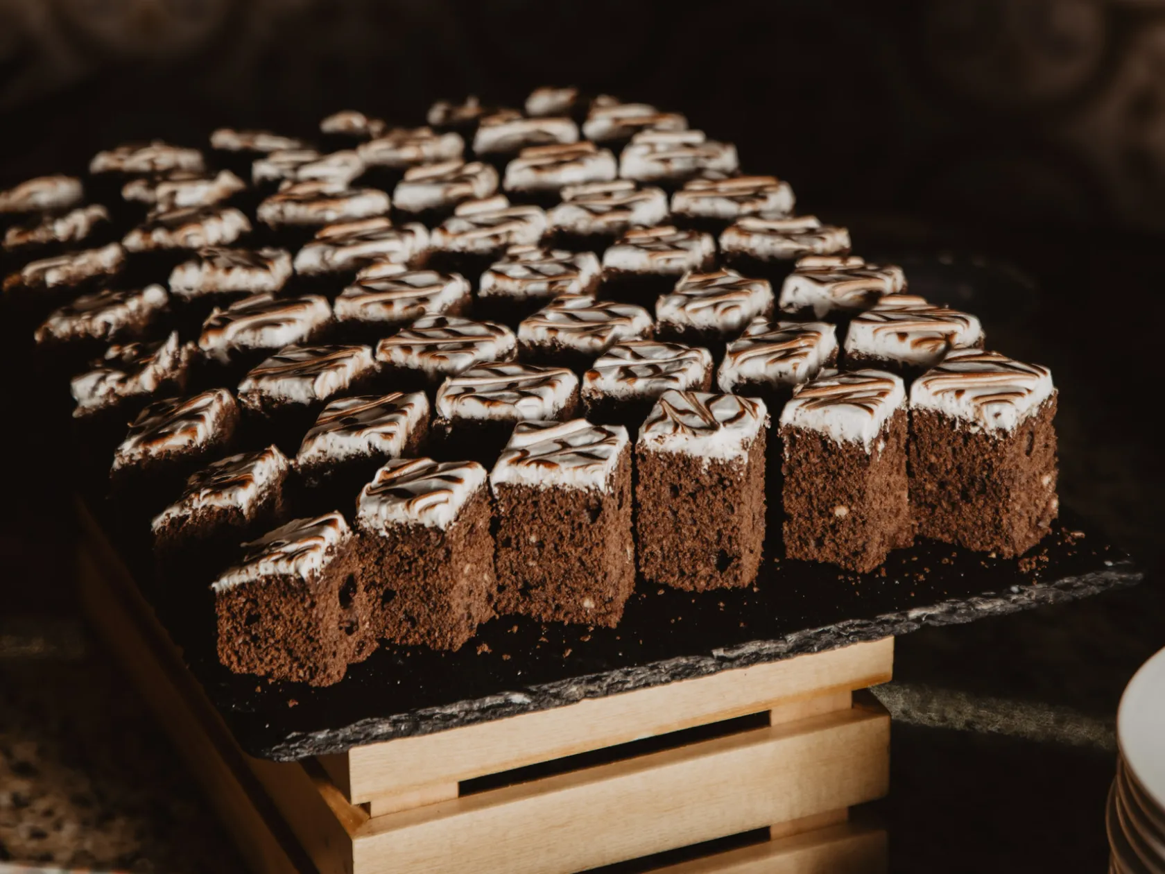 a close up of a piece of chocolate cake on a table