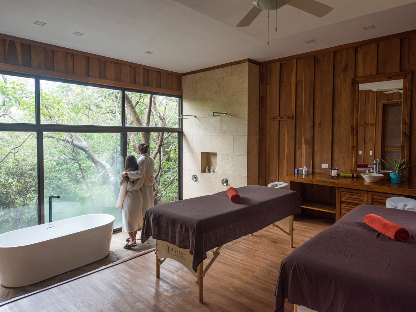 a room filled with furniture and a large window