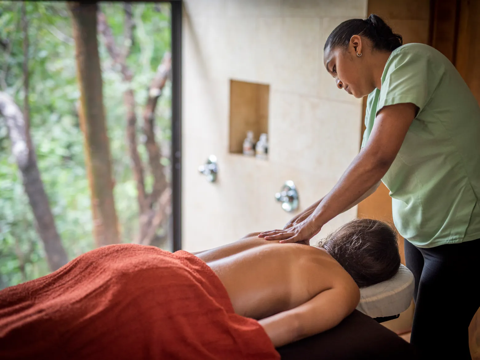 a person sitting on a bed