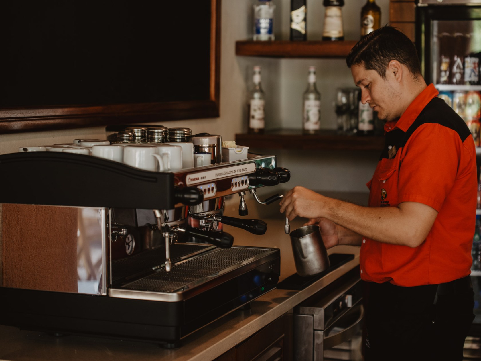 a man standing in front of a computer