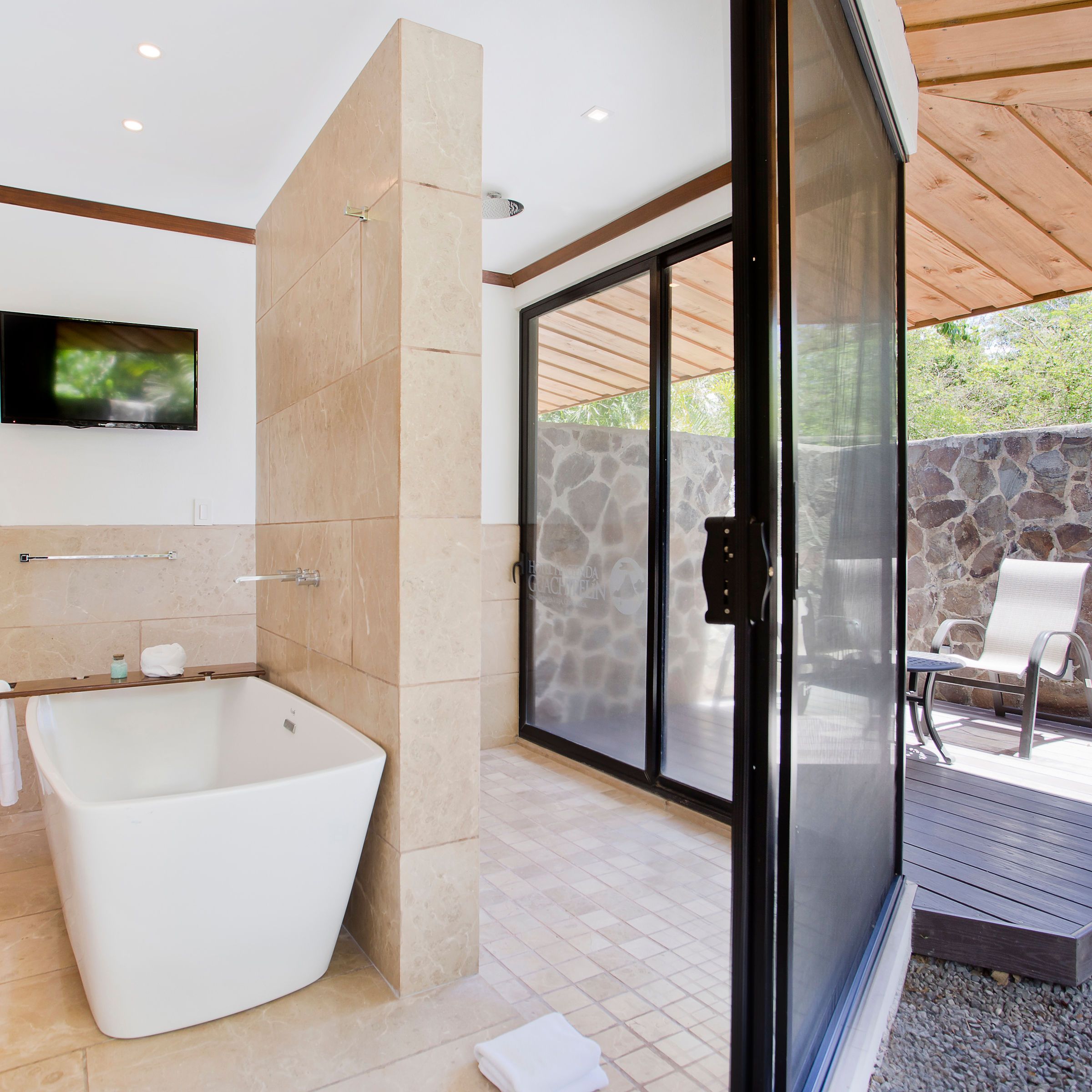 a room with a couch and a tub