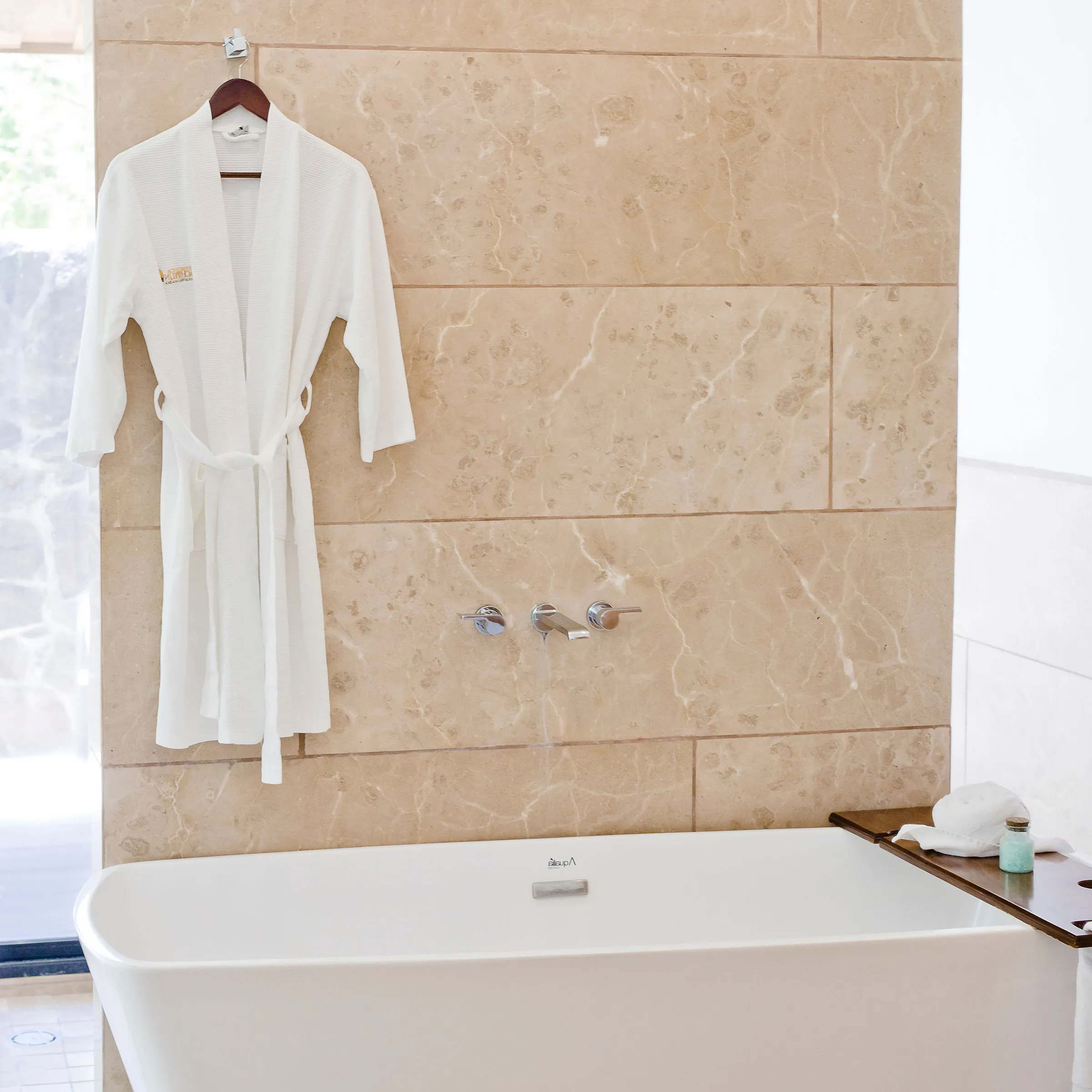 a person standing in front of a mirror posing for the camera