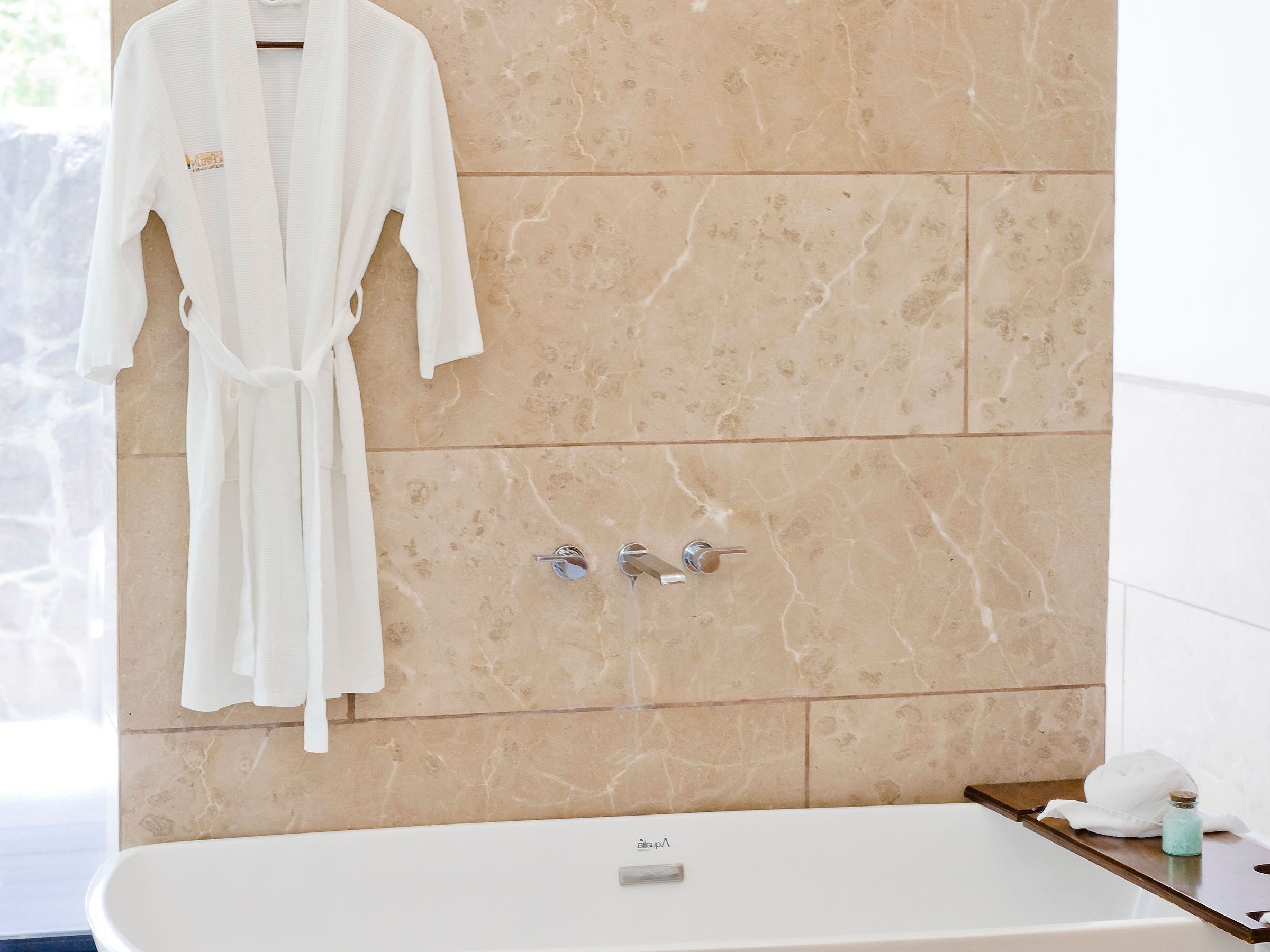 a person standing in front of a mirror posing for the camera