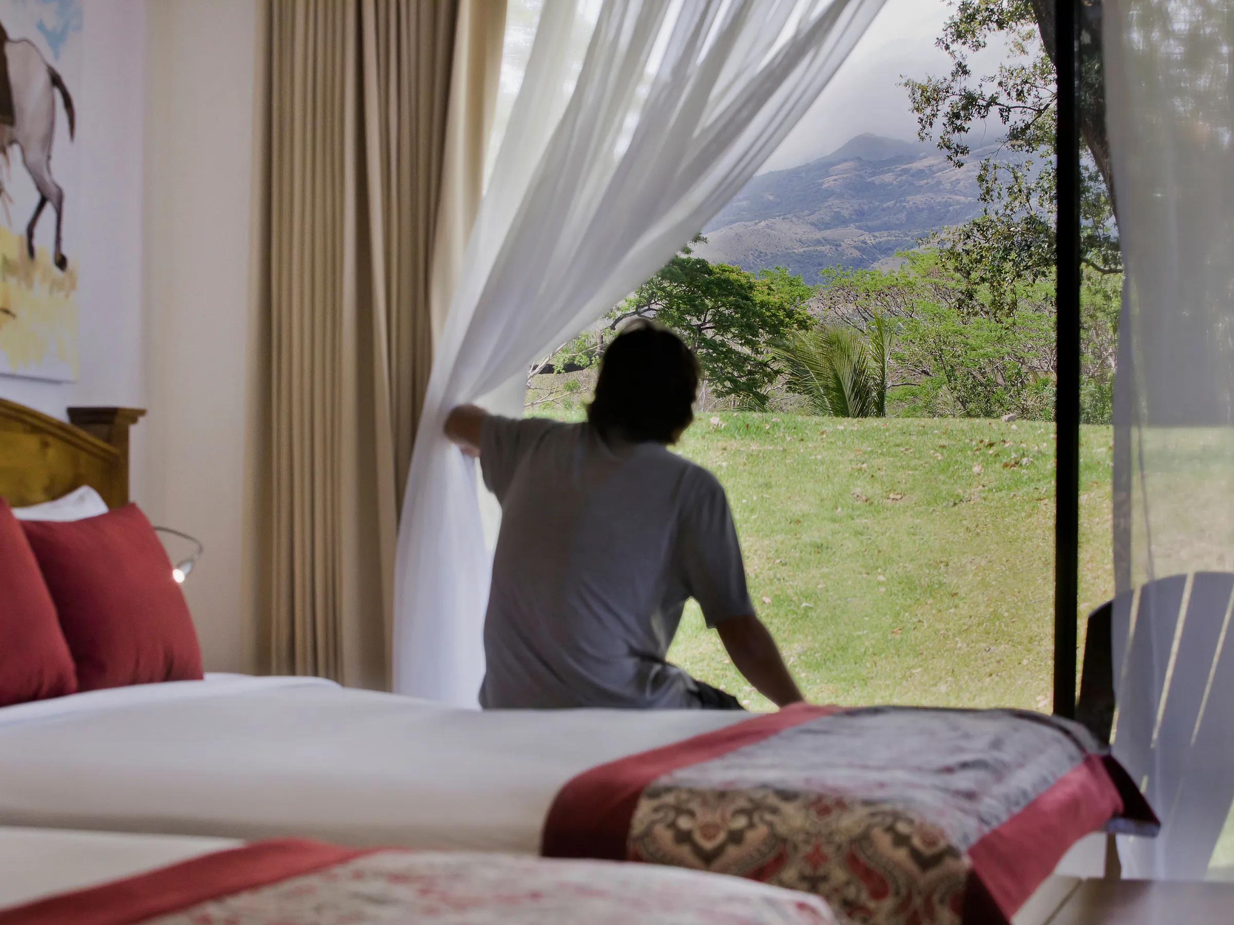 a person sitting on a bed