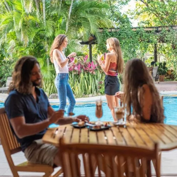 a group of people sitting at a table