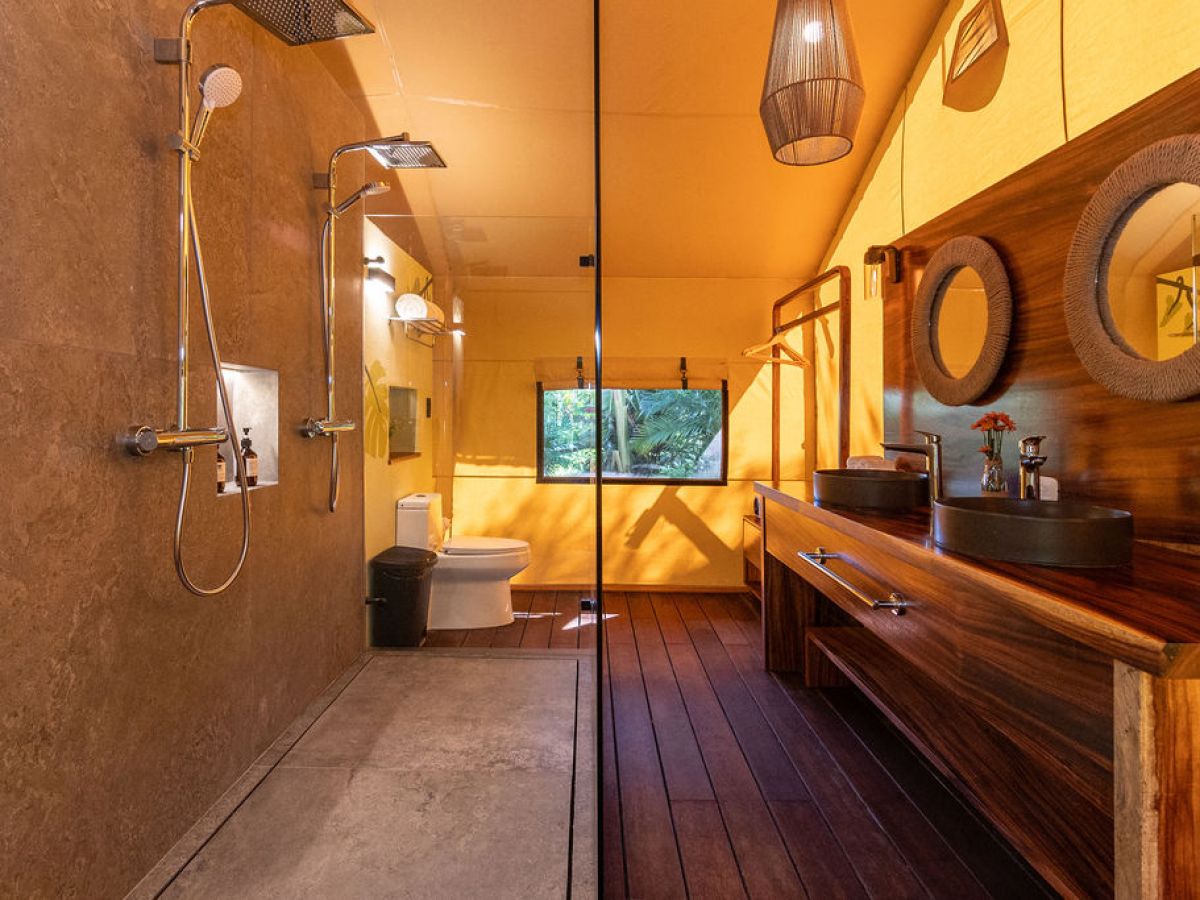 a kitchen area with wooden wheels in a room