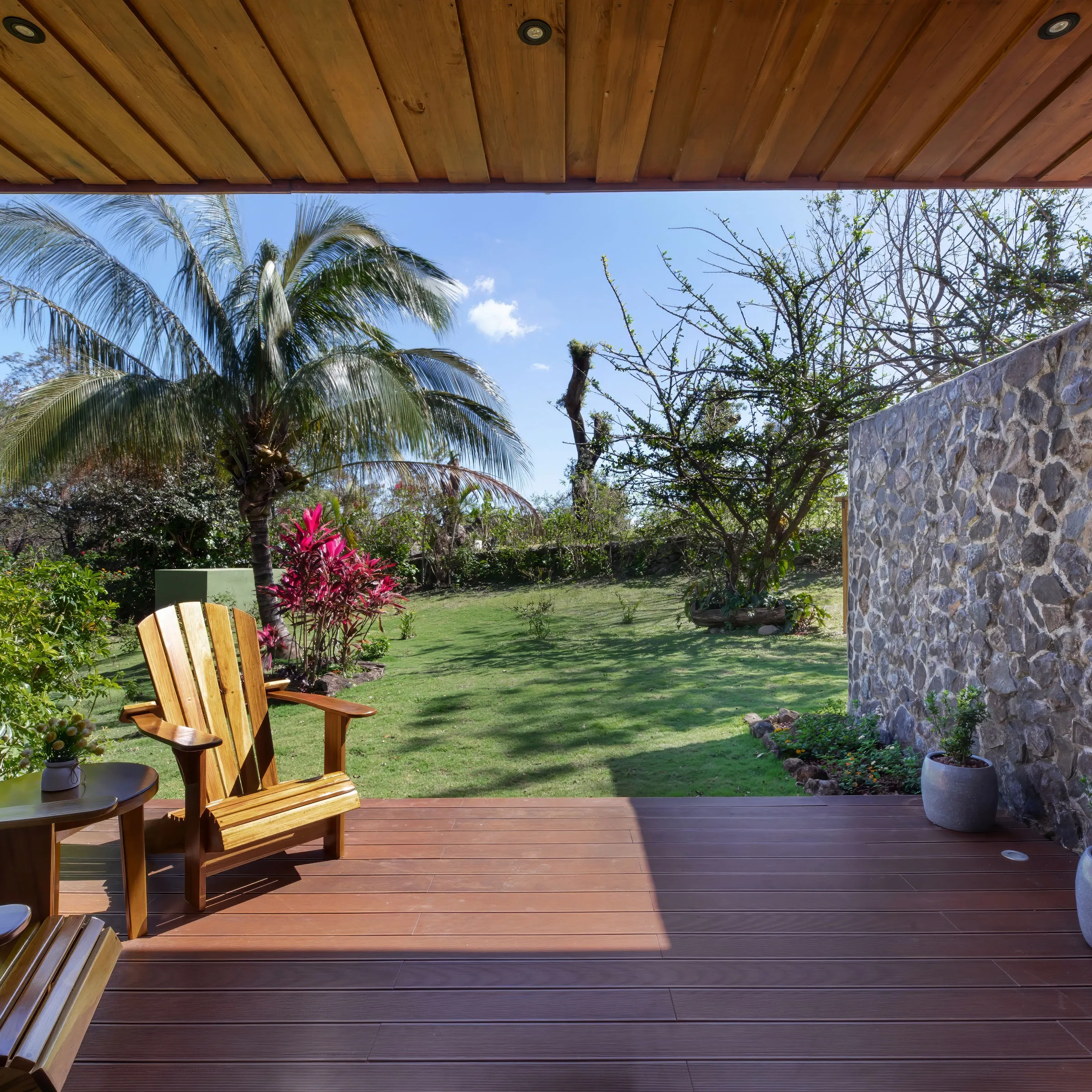 a wooden bench sitting in front of a building